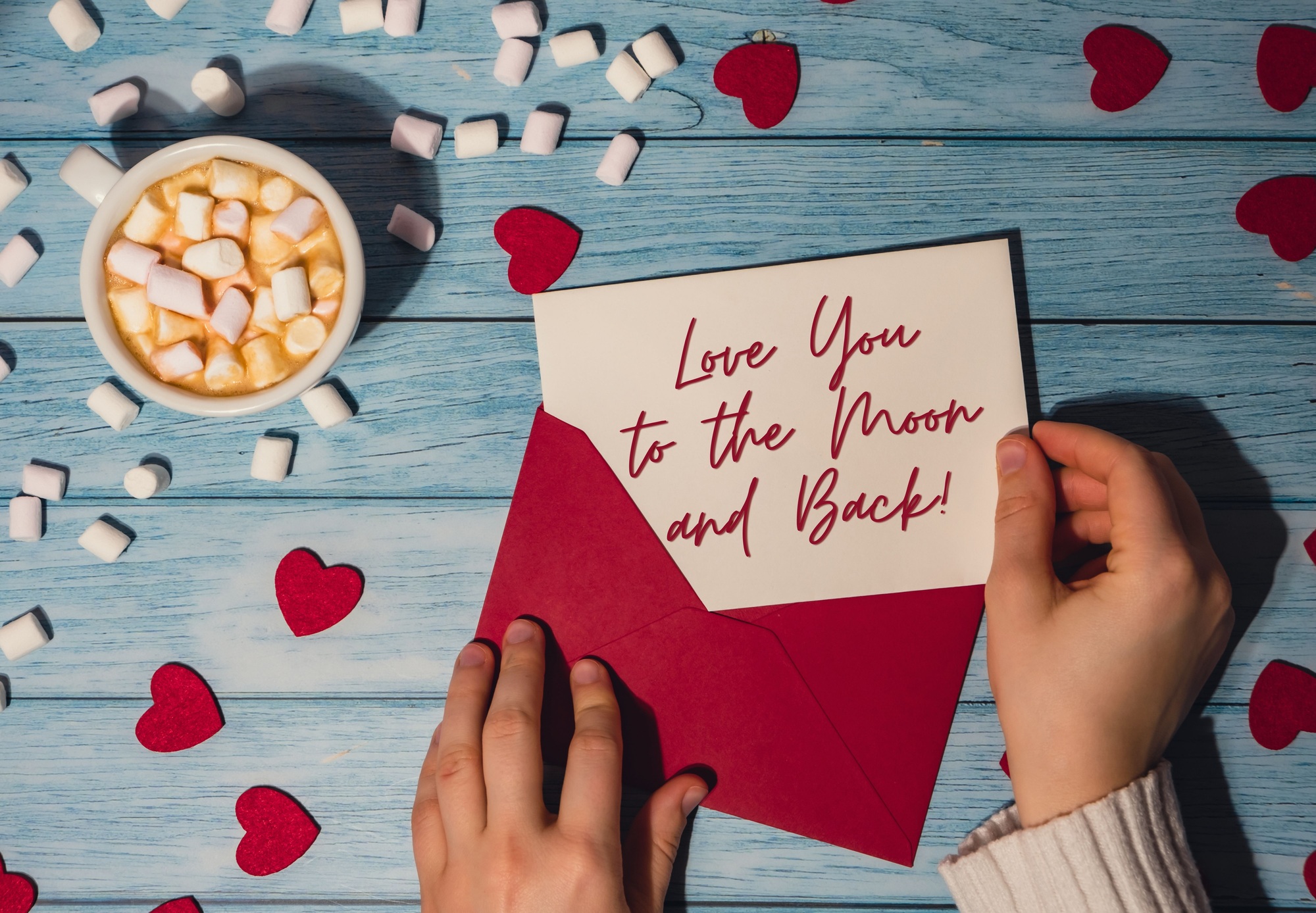LOVE YOU TO THE MOON AND BACK text on valentine card inscription positive quote, motivation and